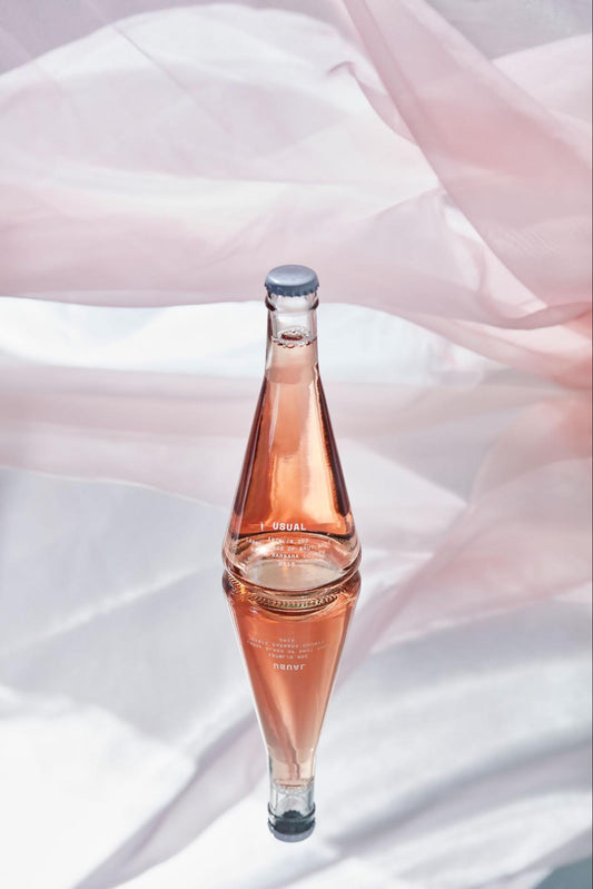 low sugar wine: Usual Wines bottle on a table