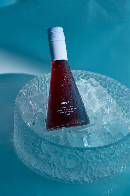 do you chill red wine: bottle of red wine from Usual Wines on ice