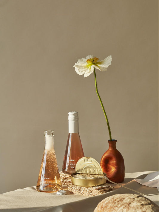 Keto wine: Usual Wines rose and brut rose next to flower vase