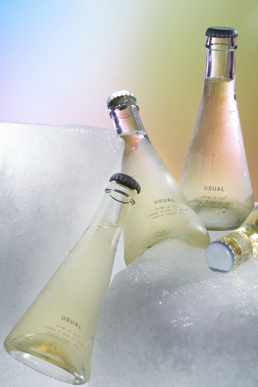 Riesling Wine: bottles of Usual Wines on ice