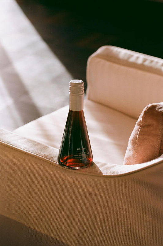 Pinot Noir Wine: red varietal in couch side arm