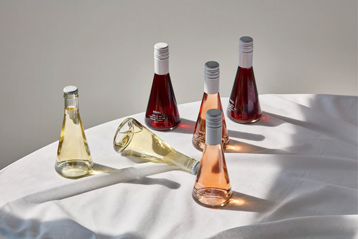 6 Bottles of wine on a white background